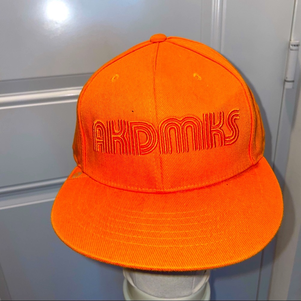 Orange fitted akdmks hat